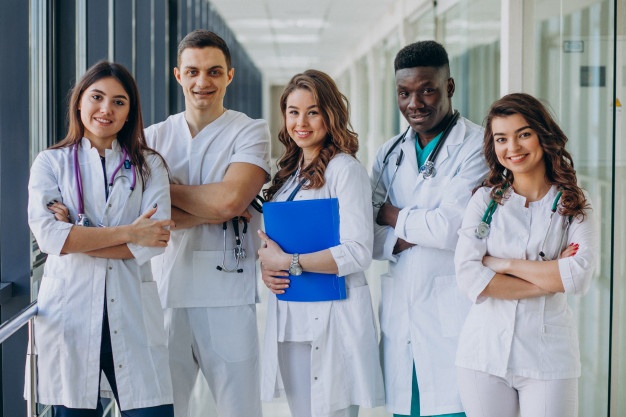 team young specialist doctors standing corridor hospital 1303 21199 - Family Doctor Training In Malaysia